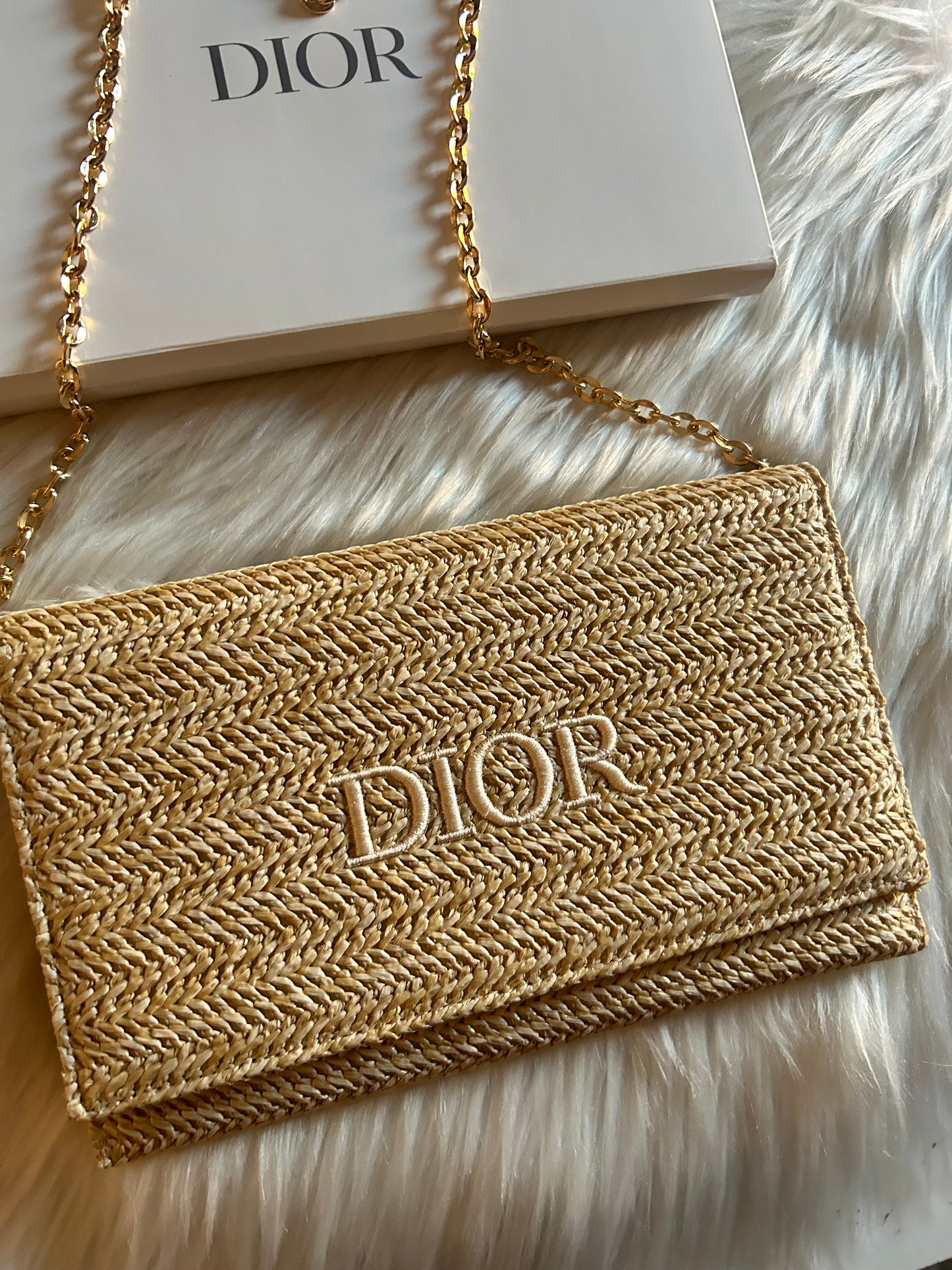 Pochette Dior in rafia