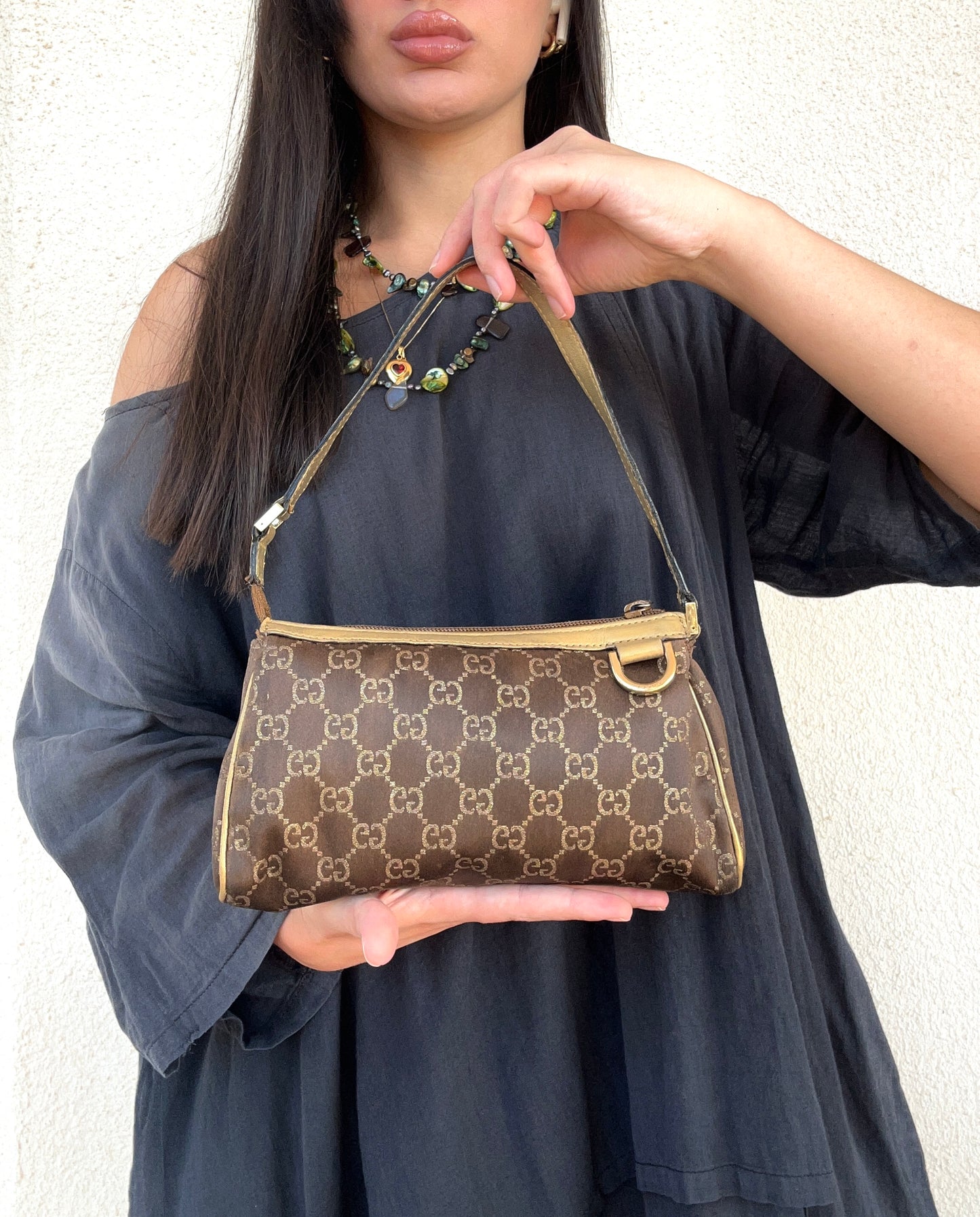 Gucci Abbey pochette dorata