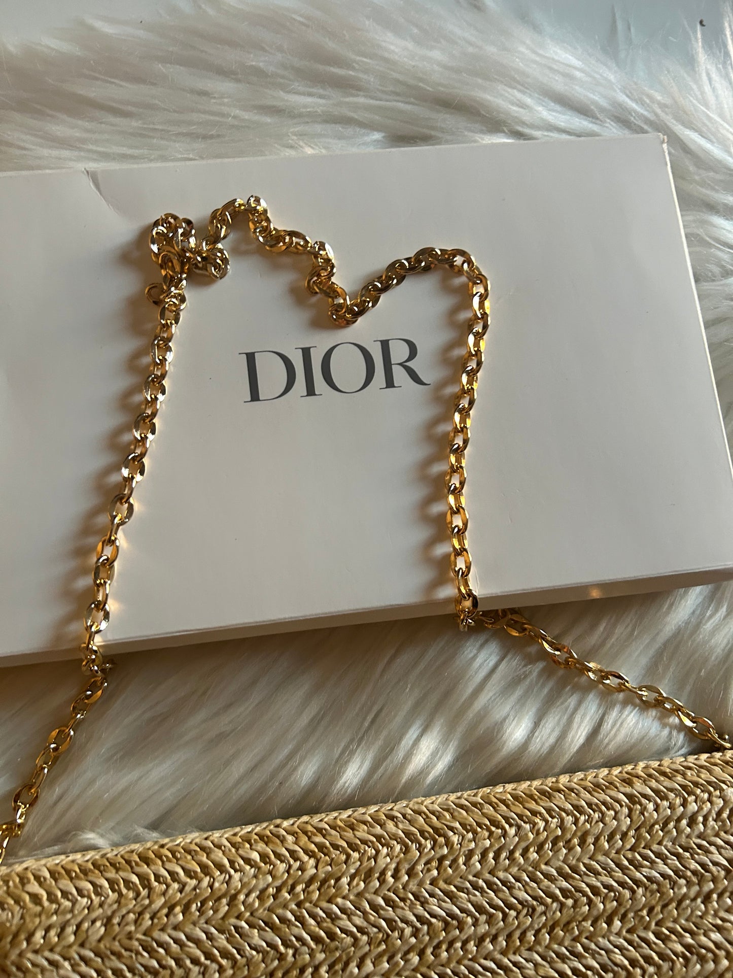 Pochette Dior in rafia