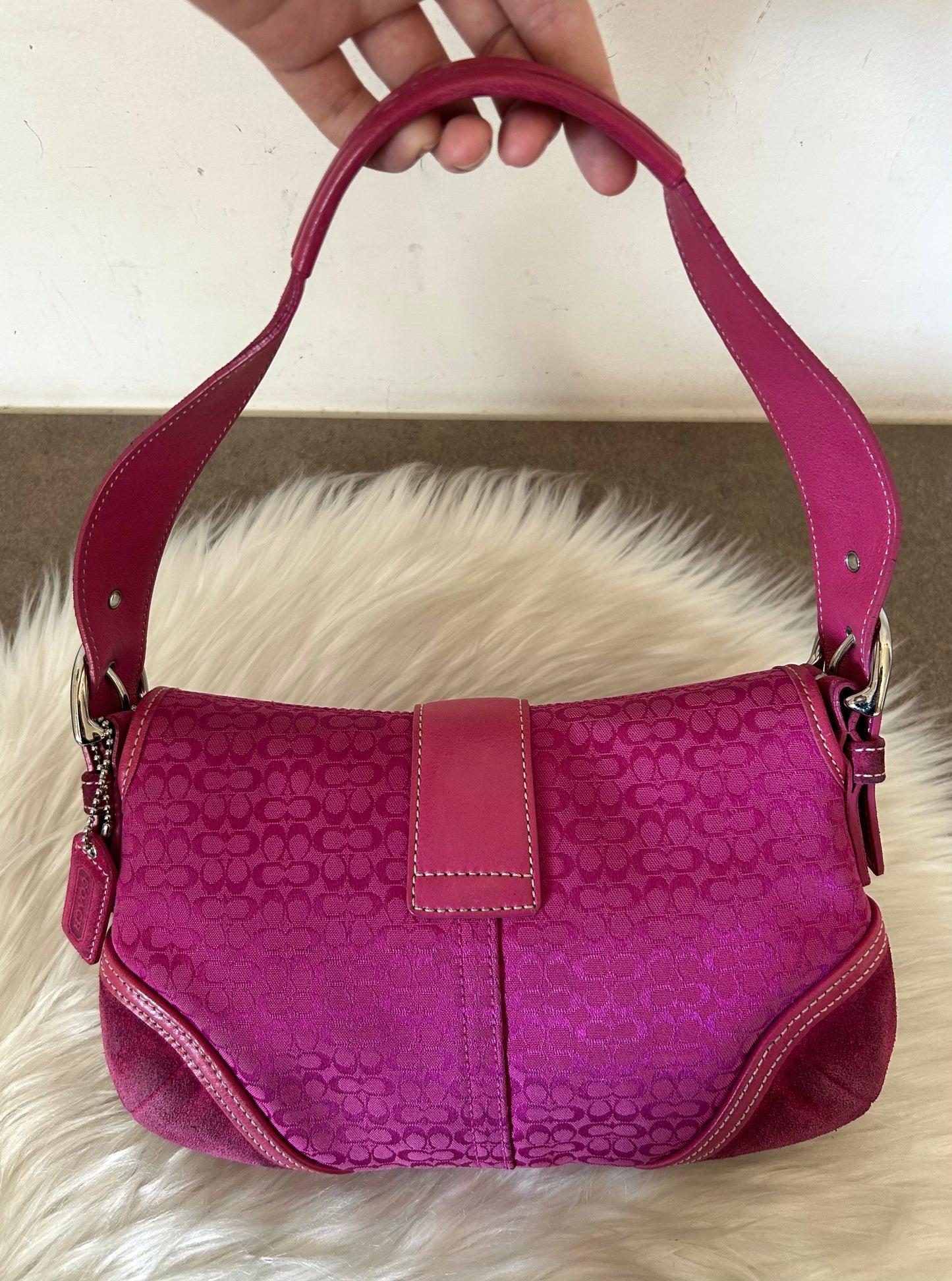 Coach Signature Sufflette rosa in monogram