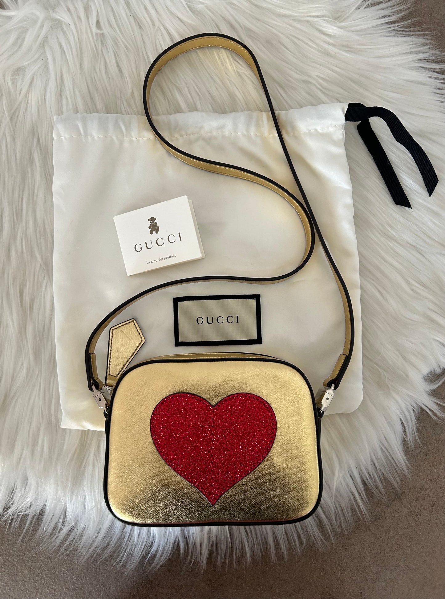 Gucci mini bag oro con cuore glitterato