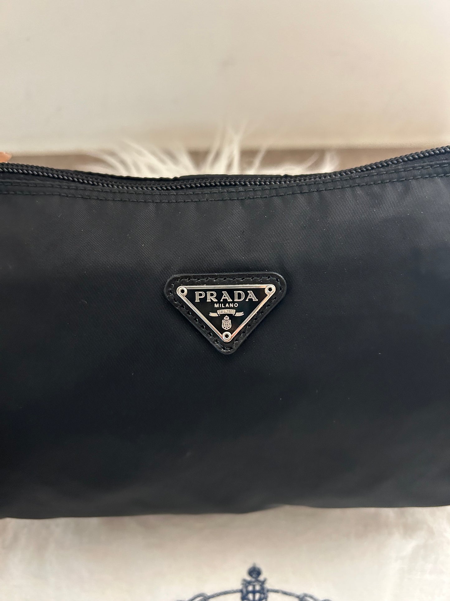 Pochette Prada in nylon nera