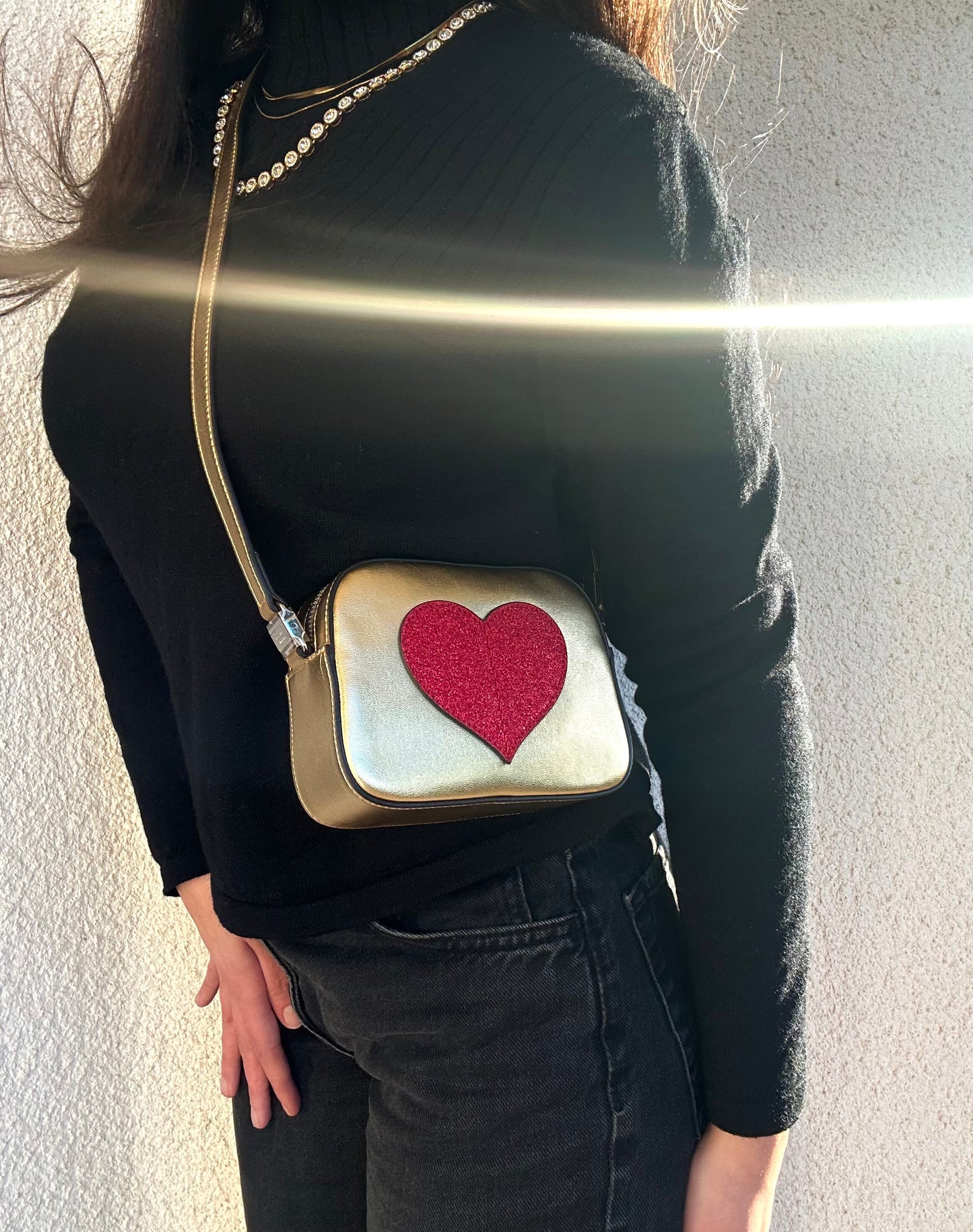 Gucci mini bag oro con cuore glitterato