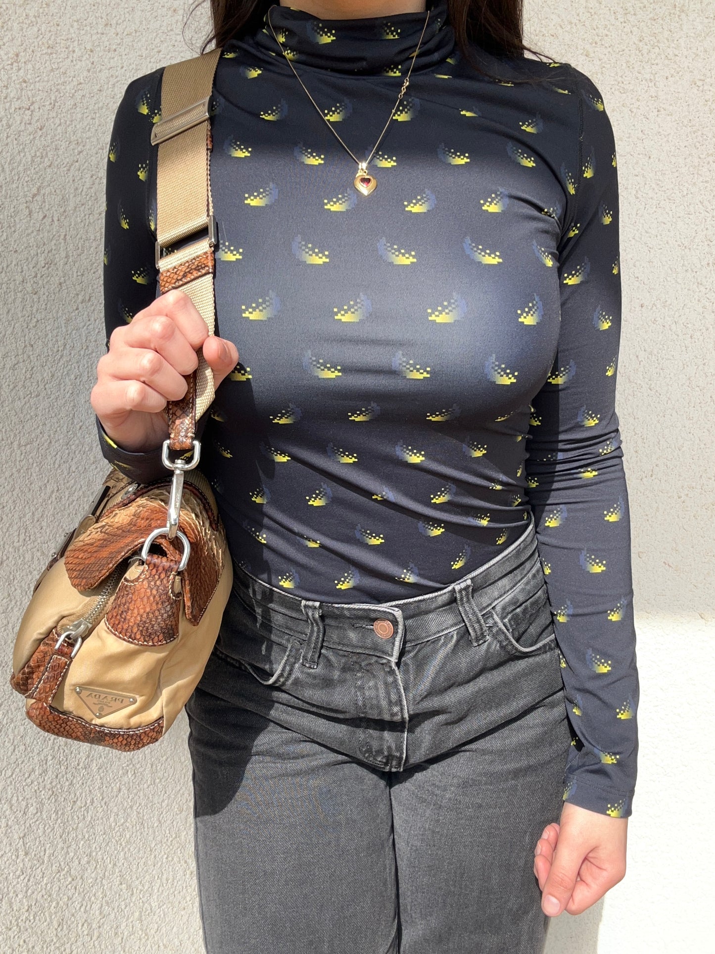 Prada Multipocket baguette in pelle di pitone e nylon
