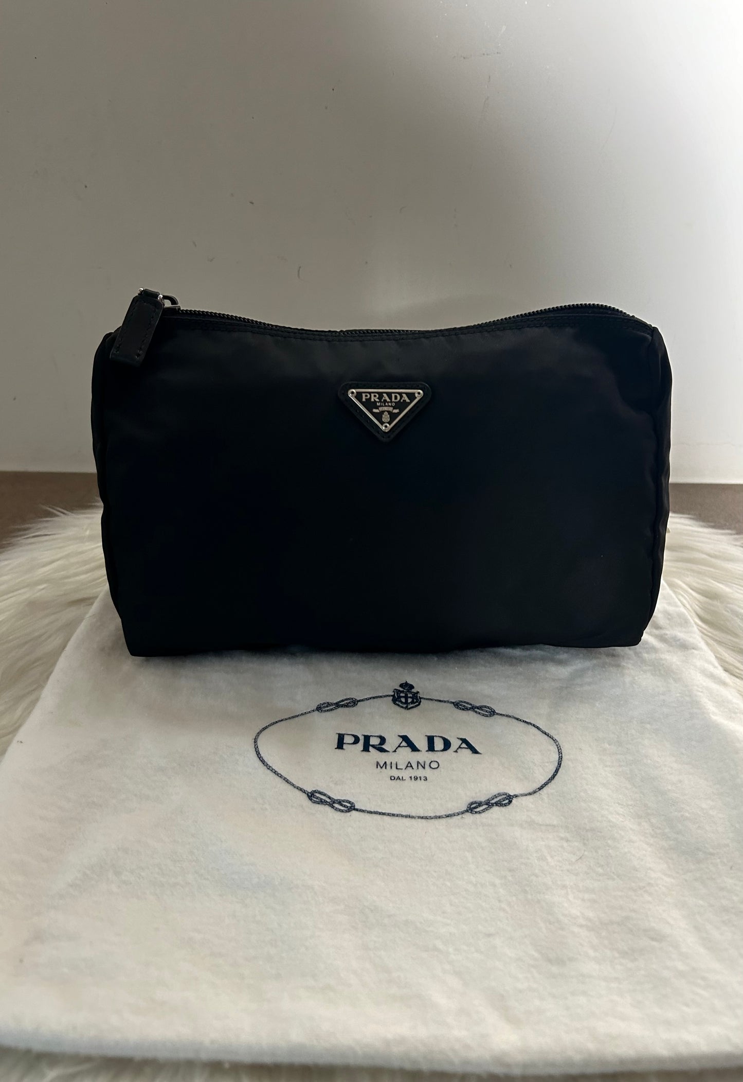 Pochette Prada in nylon nera