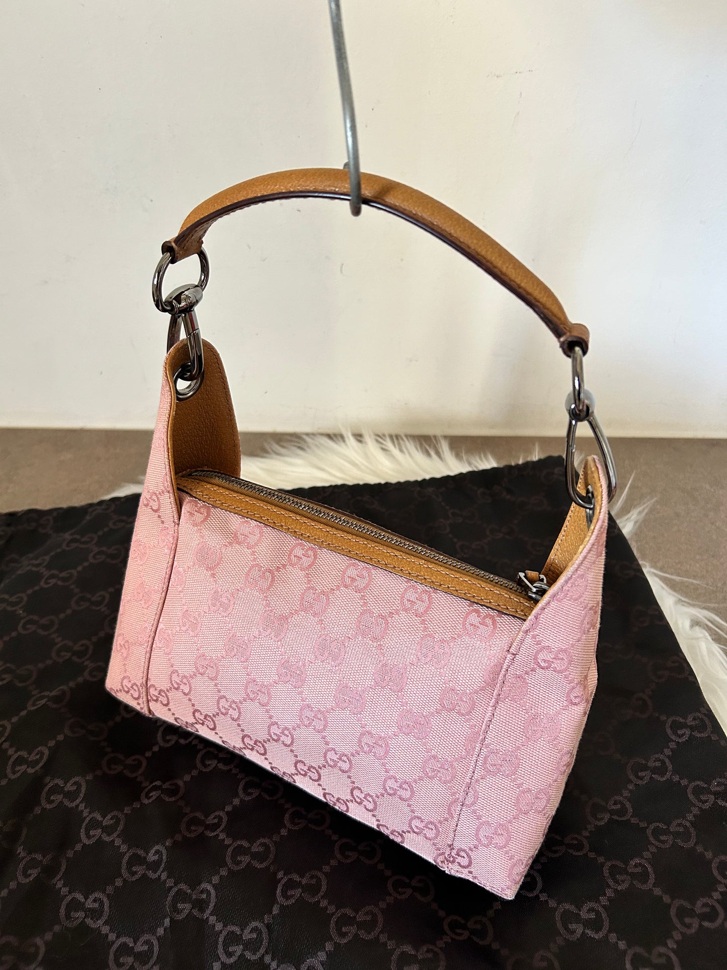 Gucci Pochette in monogram rosa