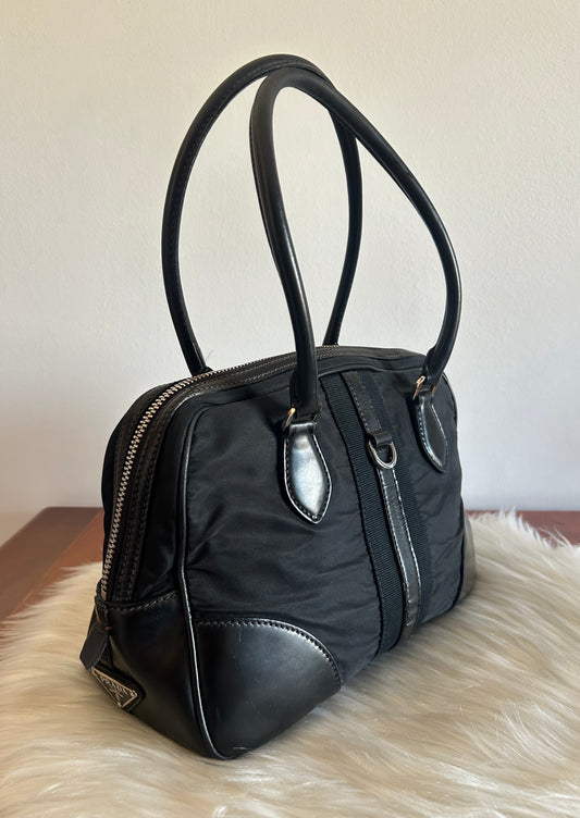 Prada tote nera in tela e pelle