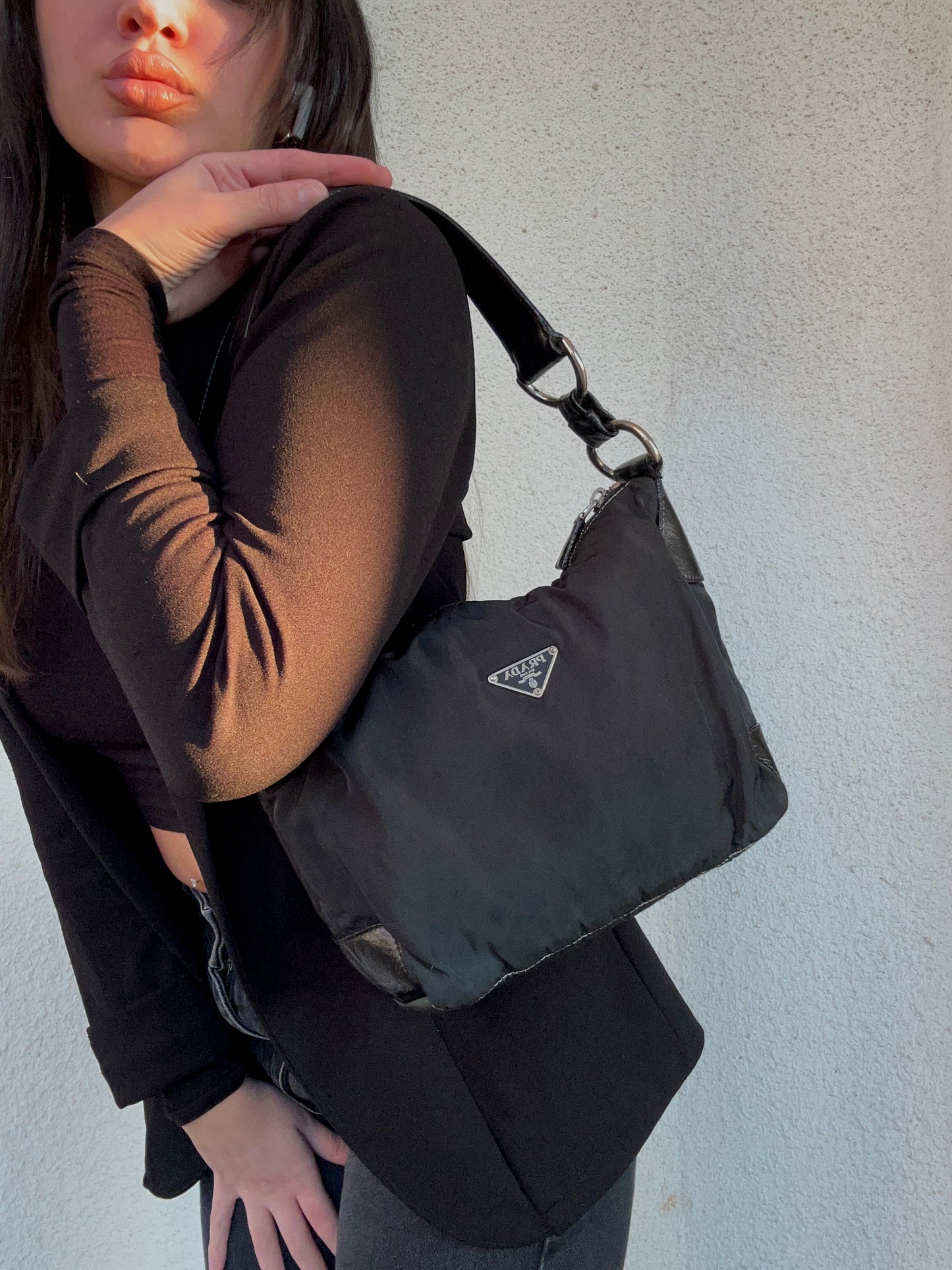 Prada Baguette in nylon e pelle nera