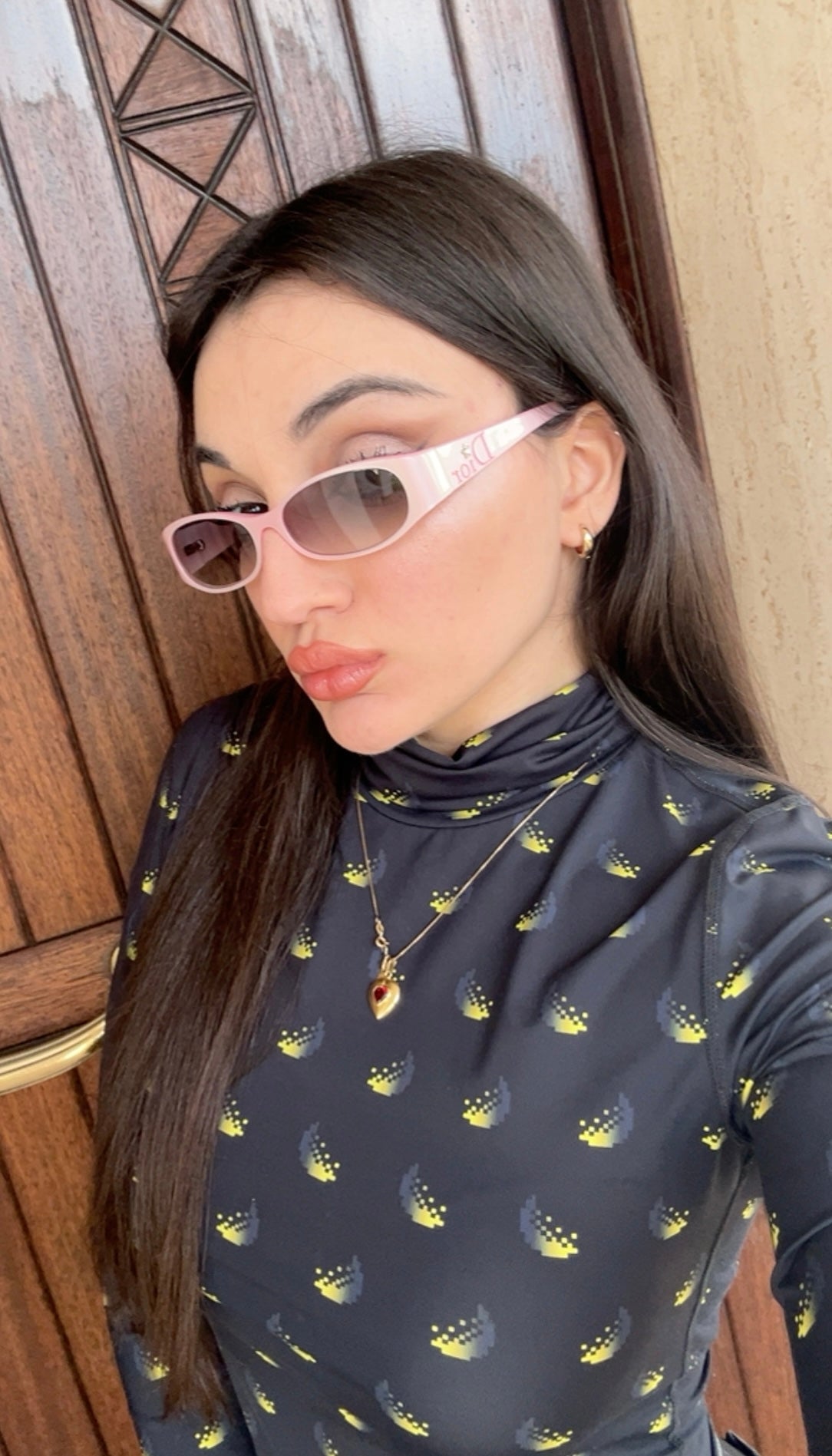 Dior occhiali da sole rosa con stellina