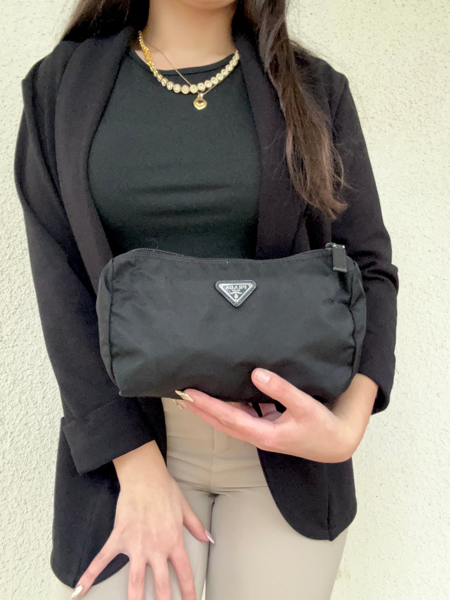 Pochette Prada in nylon nera