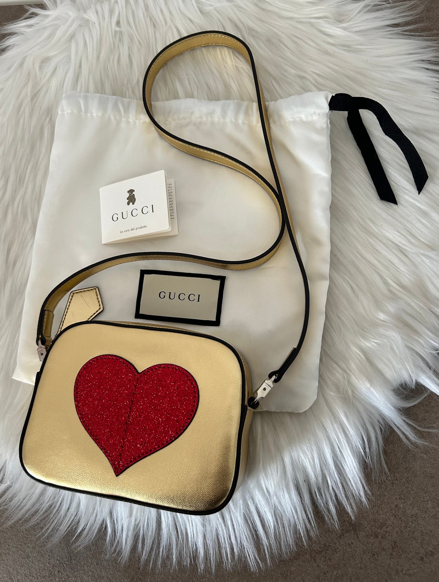Gucci mini bag oro con cuore glitterato