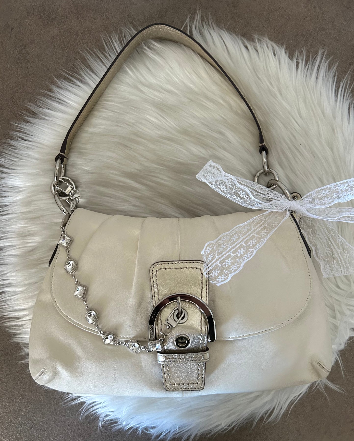 Coach Signature Sufflette in pelle