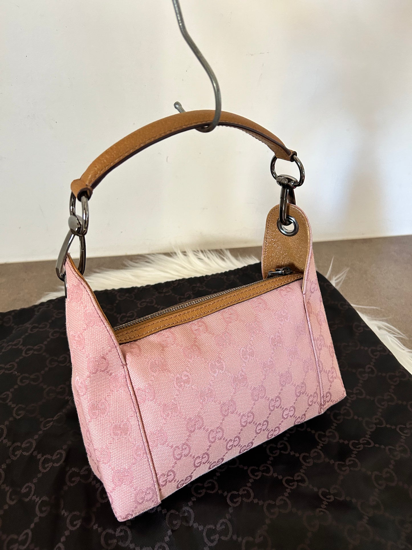 Gucci Pochette in monogram rosa