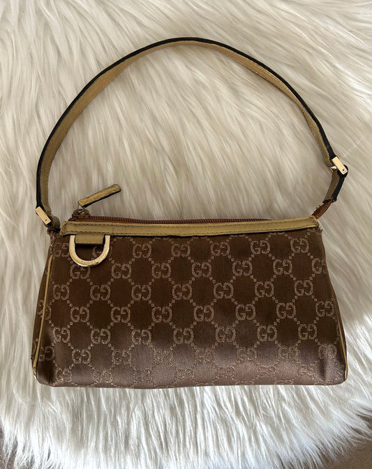 Gucci Abbey dorata in monogram